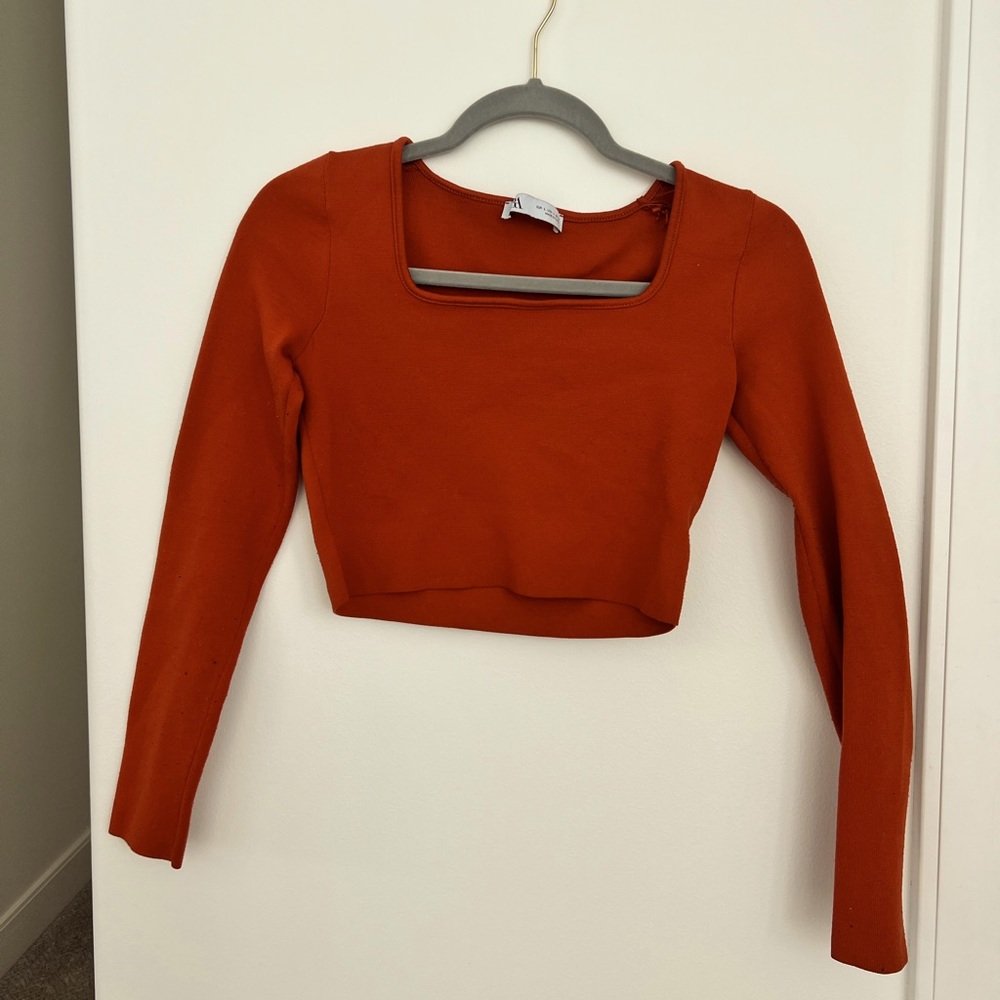 Orange squarneck long shirt.